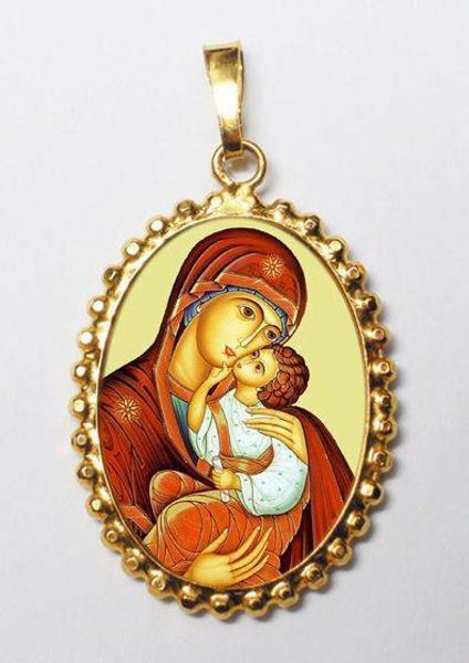 Picture of Our Lady of the Incarnation Gold plated Silver and Porcelain Pendant with crown frame mm 24x30 (0,94x1,18 inch) for Woman