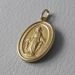 Picture of Our Lady of Graces Regina sine labe originali concepta o.p.n. Coining Sacred Oval Medal Pendant gr 4,9 Yellow Gold 18k Unisex Woman Man 