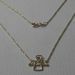 Picture of Necklace Yellow Gold 18 kt Angel with Heart gr.2,30 for Woman and Girl