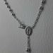 Imagen de Collar Rosario largo Cuello Redondo con Medalla Nuestra Señora Milagrosa y Cruz gr 6,2 Oro blanco 18kt con Esferas diamantadas para Mujer 