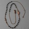 Imagen de Cadena Rosario para hombre gr 5,2 oro rosa 18k y ónice negro