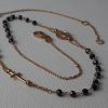 Imagen de Cadena Rosario para hombre gr 5,2 oro rosa 18k y ónice negro