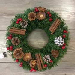 Picture of Christmas Wreath in plastic PVC diam. cm 35 (13,8 inch) green with natural decorations, red berries and cones