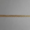 Picture of Gold Agremano Fleur-de-lis H. 0,8 cm (0,31 inch) metallic thread & viscose