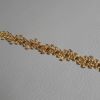 Immagine di Agremano oro doppio pizzetto H. 1,20 filato metallico e viscosa