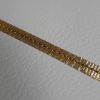 Imagen de Agreman dorado H. 0,6 cm hilo metálico y viscosa para vestimenta 