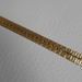 Picture of Agremano Braided Trim gold metal H. cm 0,6 (0,24 inch) Metallic thread and Viscose Border Edge Trimming for liturgical Vestments