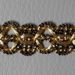 Immagine di Agremano oro chiaro antico H. cm 1,5 (0,59 inch.) Viscosa Poliestere Orlo Bordo Passamaneria per Paramenti sacri 