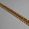 Imagen de Agreman dorado H. 1 cm viscosa y poliéster para vestimenta 