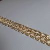 Picture of Gold Agremano Fleur-de-lis H. 1,5 cm (0,6 inch) metallic thread & viscose