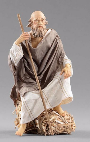 Picture of Elderly Shepherd sitting cm 12 (4,7 inch) Hannah Orient dressed nativity scene Val Gardena wood statue with fabric dresses 