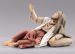 Picture of Amazed Shepherd lying  cm 55 (21,7 inch) Hannah Orient dressed nativity scene Val Gardena wood statue with fabric dresses 