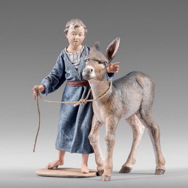 Picture of Boy with little Donkey 10 cm (3,9 inch) Immanuel dressed Nativity Scene oriental style Val Gardena wood statue fabric clothes