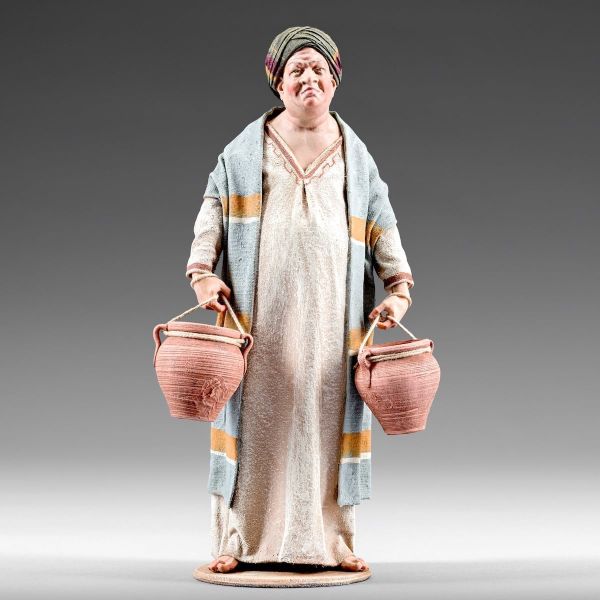 Imagen de Uomo de pie con ánforas cm 10 (3,9 inch) Pesebre vestido Immanuel estilo oriental estatua en madera Val Gardena trajes de tela