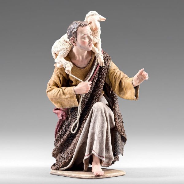 Picture of Kneeling Shepherd with Lamb Immanuel 12 cm (4,7 inch)) middle eastern wood & fabric