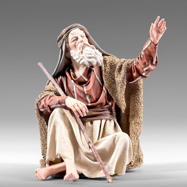 Picture of Shepherd sitting cm 12 (4,7 inch) Immanuel dressed Nativity Scene oriental style Val Gardena wood statue fabric clothes