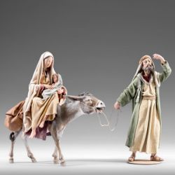 Picture of Flight into Egypt 10 cm (3,9 inch) Immanuel dressed Nativity Scene oriental style Val Gardena wood statues fabric clothes