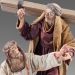 Picture of Simon of Cyrene helps Jesus to carry his cross 10 cm (3,9 inch) Immanuel dressed Nativity Scene oriental style Val Gardena wood statues fabric clothes