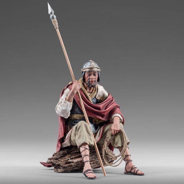 Picture of Soldier sitting 12 cm (4,7 inch) Immanuel dressed Nativity Scene oriental style Val Gardena wood statue fabric clothes