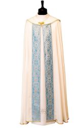 Picture of Marian Cope in pure cream silk with light blue galloon and rich embroidery 